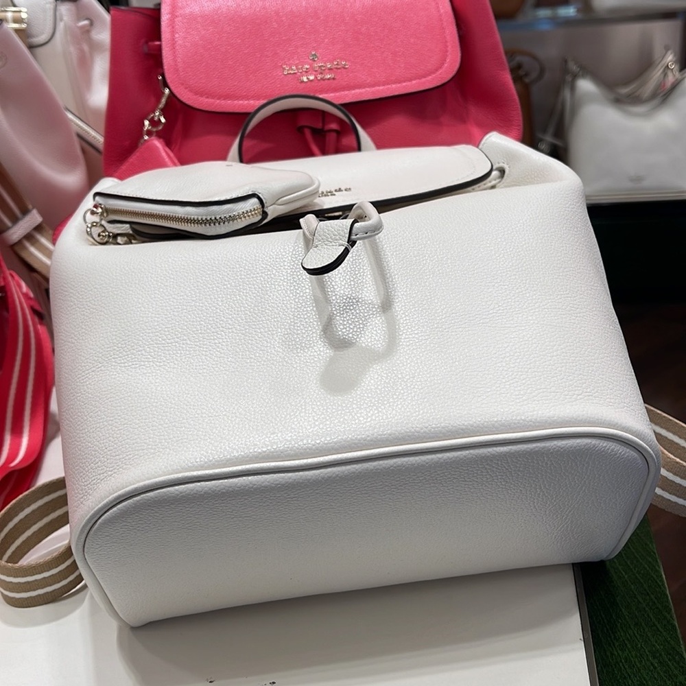 Kate Spade Rosie Medium Flap Backpack 
K8714 pebbled leather Parchment rosie
NWT - Picture 8 of 16